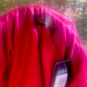 Brand new jacket with tags, red with white fur accents